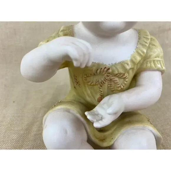 Vintage Bisque Porcelain Piano Baby Figurine 7”